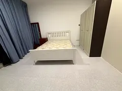 Furnished room available for single lady next to emirates tower metro-3200 including dewa and intern