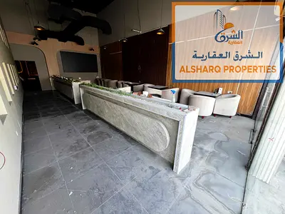 محل تجاري 6000 قدم في الجرف 2 عجمان | ميزانين وتشطيب وديكور جديد | مجهز بالكامل | تكييف مركزي | باركينج | إيجار 350 ألف | خلو 250 أل