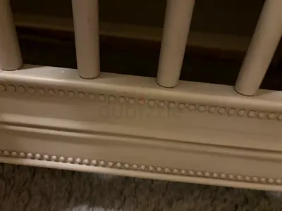 White Baby Crib with Decorative Beading