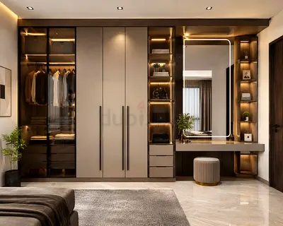 Modern built-in bedroom wardrobe with vanity and LED lighting