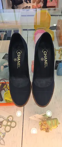 Chanel black espadrille flats — classic CC logo, size unknown, gently used