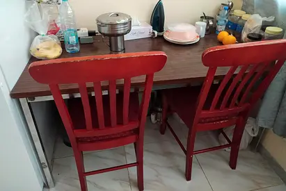 Wooden Dining Table with Two Red Chairs - Used, Good Condition