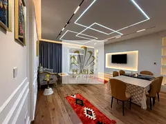 Fully furnished 2BR in Horizon Towers, Al Rashidiya 1, opposite Safeer Mall, with 3 bathrooms, 2 bal