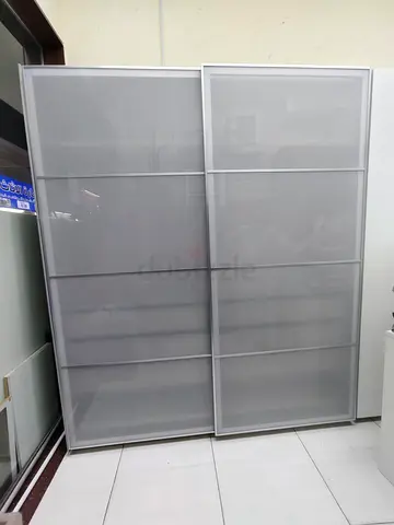 Sliding wardrobe doors with grey mesh panels (pair) - good condition