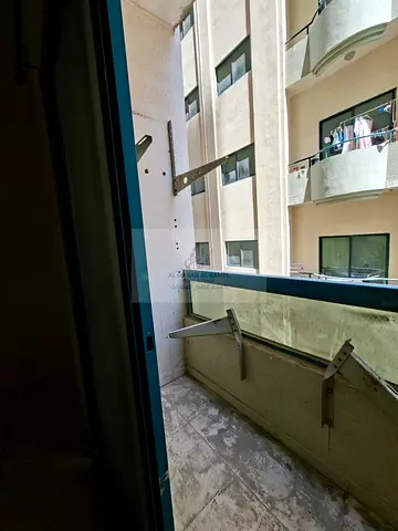 1-Bedroom Apartment for Rent in Al Qasimia with Comfortable Living Room, Prime Location Near Schools, Malls, Restaurants and All Daily Services
