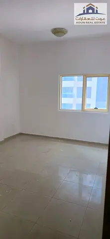 Al Khan: A spacious and comfortable one-bedroom apartment with a living room and kitchen. It is clean, in excellent condition, and ready for immediate