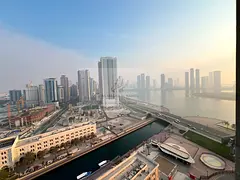 Available Now in Al Qasba Spacious 3-bedroom apartment where all bedrooms are en-suite, featuring a