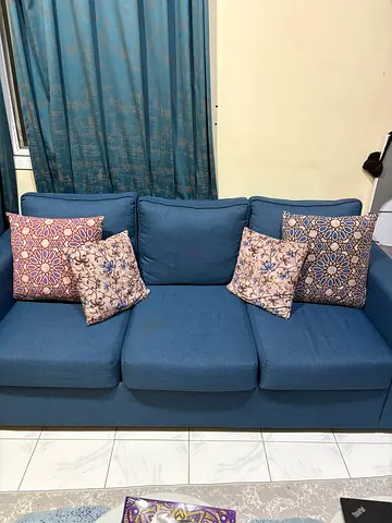 Blue 3-seater fabric sofa in good condition with cushions with free curtain
