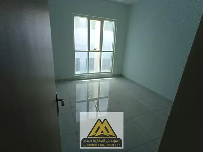 Two bedrooms and a living room for rent in the first row from Ajman Corniche | New building, second