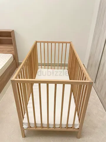 Cot bed with mattress