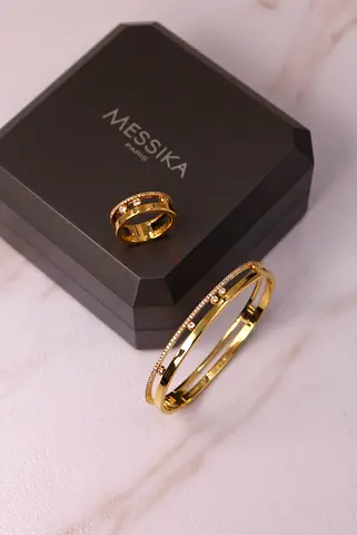 Messika gold bangle and matching ring set with diamonds