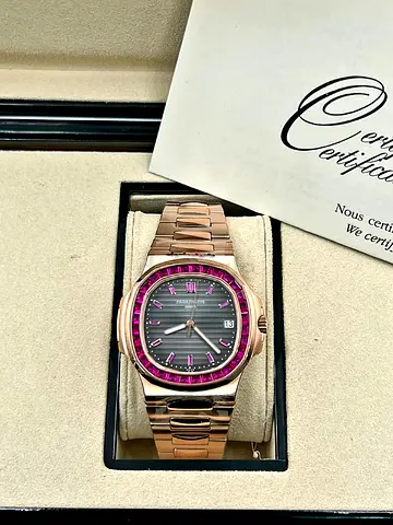 This is a Patek Philippe Nautilus super master quality swing machine superclone in 18k rose gold fea