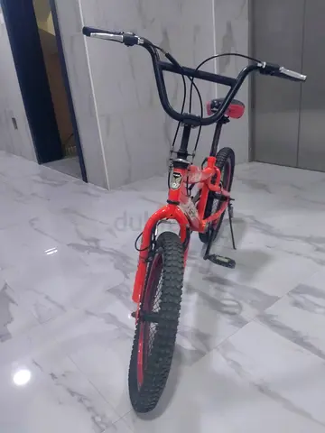 Red kids BMX-style bicycle - good condition only wall leakage Urgent sale