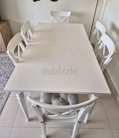 Ikea dining table with 6 chairs available in perfect condition
