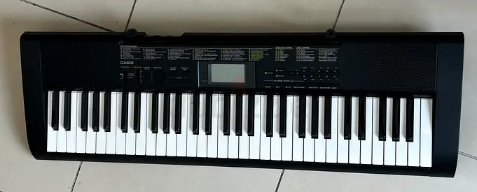 Casio 61-Key Portable Keyboard with Song Book and Holder - Excellent Working Condition