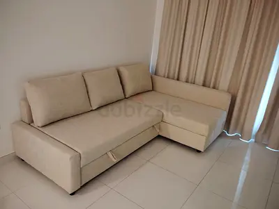 Beige L-shaped Sofa Bed with Storage, Good Condition