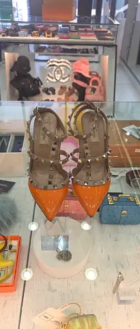 Women's pointed-toe studded slingback heels - orange patent, size unknown