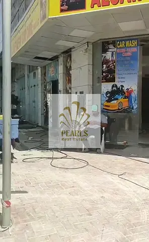 Established Car Wash & Detailing Business for Sale in Al Nuaimiya 3 Ajman - Corner Shop - High ROI