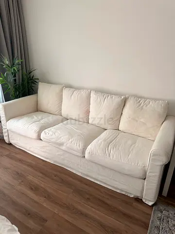 Cream 3-4 seater fabric sofa in good condition
