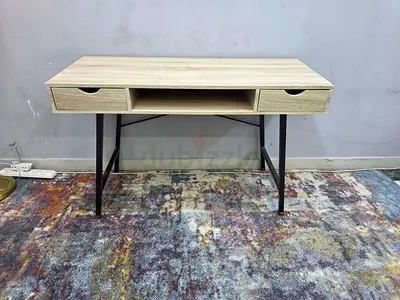 Light wood study desk with metal legs and two drawers