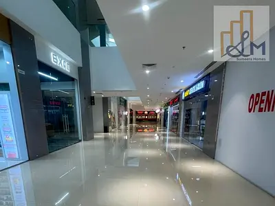 محل بيع بالتجزئة ط مقابل -القرية العالمية