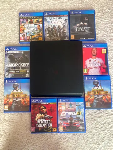 PlayStation 4 Slim with 10 Games - Good Condition