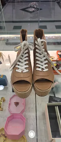 Beige leather espadrille wedge sneakers, size not marked