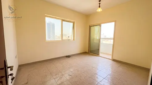 Two-bedroom apartment for annual rent in Al Rashidiya 2 near Ladies Park Two bathrooms, balcony open view ready to move in