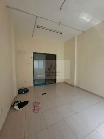1-Bedroom Apartment for Rent in Al Qasimia with Comfortable Living Room, Prime Location Near Schools, Malls, Restaurants and All Daily Services