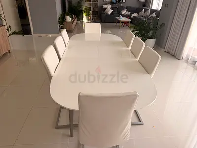 White Extendable Dining Table with 8 Chairs and match cabinet - Home Centre