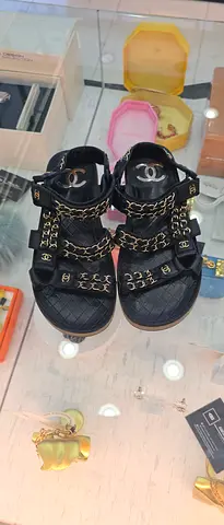 Chanel black leather chain-strap sneakers, size likely EU 37-38 (see measurements)