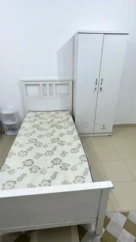 Single white wooden bed frame with mattress and wardrobe - good condition