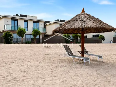 A PRESTIGIOUS ADDRESS - PRIVATE BEACH FRONTAGE