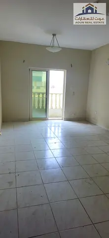 Spacious and comfortable 2-bedroom apartment with a living room available for rent in Al Khan; features 2 bathrooms and a prime location close to amen