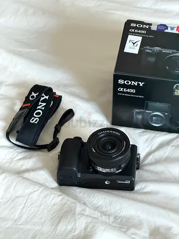 Sony A6400 mirrorless camera with 16-50mm kit lens and box
