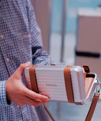 RIMOWA personal aluminium cross body bag