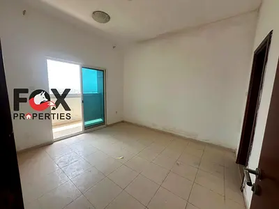 1BR for annual rent in City Tower, Ajman. 2 baths, balcony. AED 27,000/year, 4 payments, cheque deposit. Contact us now