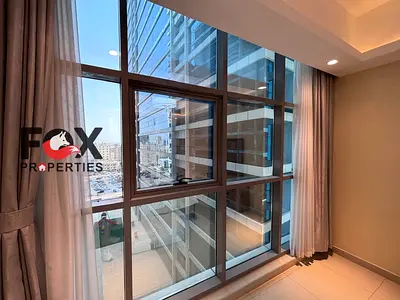 English: 1BR apartment for annual rent in Julphar Tower, Ajman. 2 bathrooms, balcony, gym, pool & g
