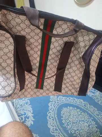 Gucci monogram canvas duffel bag with leather trim (preowned)