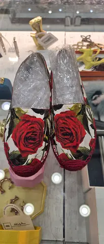 Handmade floral slip-on espadrille flats, size not labeled