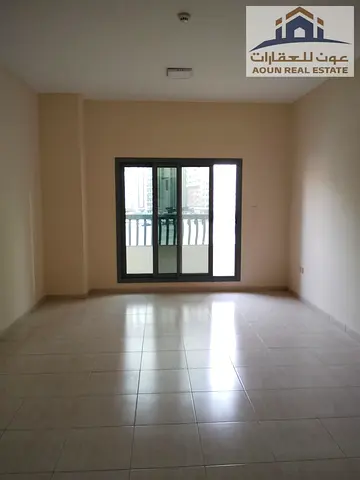 2-bedroom apartment with a living room in Al Majaz 2, featuring a balcony. Payment in 4 or 6 installments; cash security deposit; parking included.