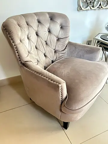 Two Gray Armchairs with Studded Trim