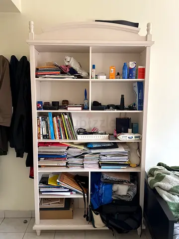 White wooden bookcase with open shelving