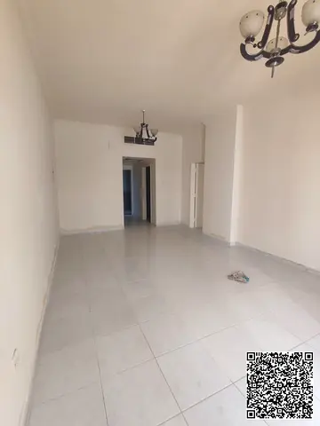 A one-bedroom apartment with a spacious living room is available for rent in Al Rashidiya, Ajman, i