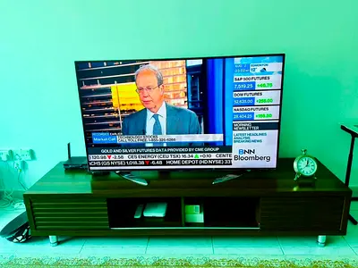 Samsung 55-inch LED Smart TV (used) with TV Stand