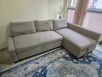 Light grey L-shaped storage sofa corner unit (storage chaise)