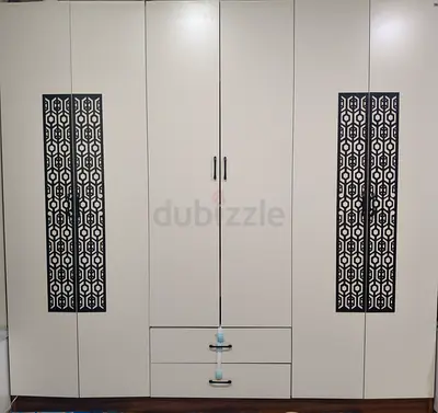 White 6-Door Wardrobe with Drawers and Decorative Panels