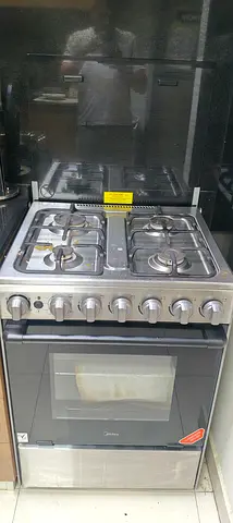 Midea 4-Burner Stainless Steel Gas Cooker with Oven (Excellent Working Condition)