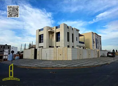 Villa for sale on a corner lot with two street frontages, including registration and ownership fees, opposite Azha Residential Complex and close to al