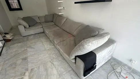 Pan Emirates Pianca corner feather filled sofa